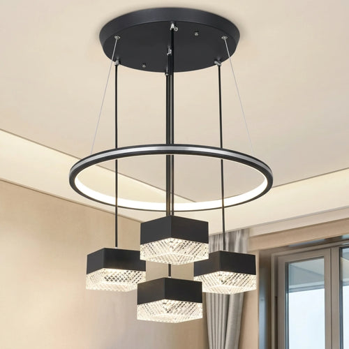 Lámpara colgante LED minimalista de aros y cubos iluminando una sala moderna en San Isidro, Lima.